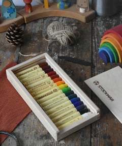 Stockmar set of 16 wax crayon sticks in a wooden storage box with scraper and scratching tool. 