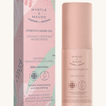 Pink with green leaves stretch mark oil box and a pink bottle on a cream background.
