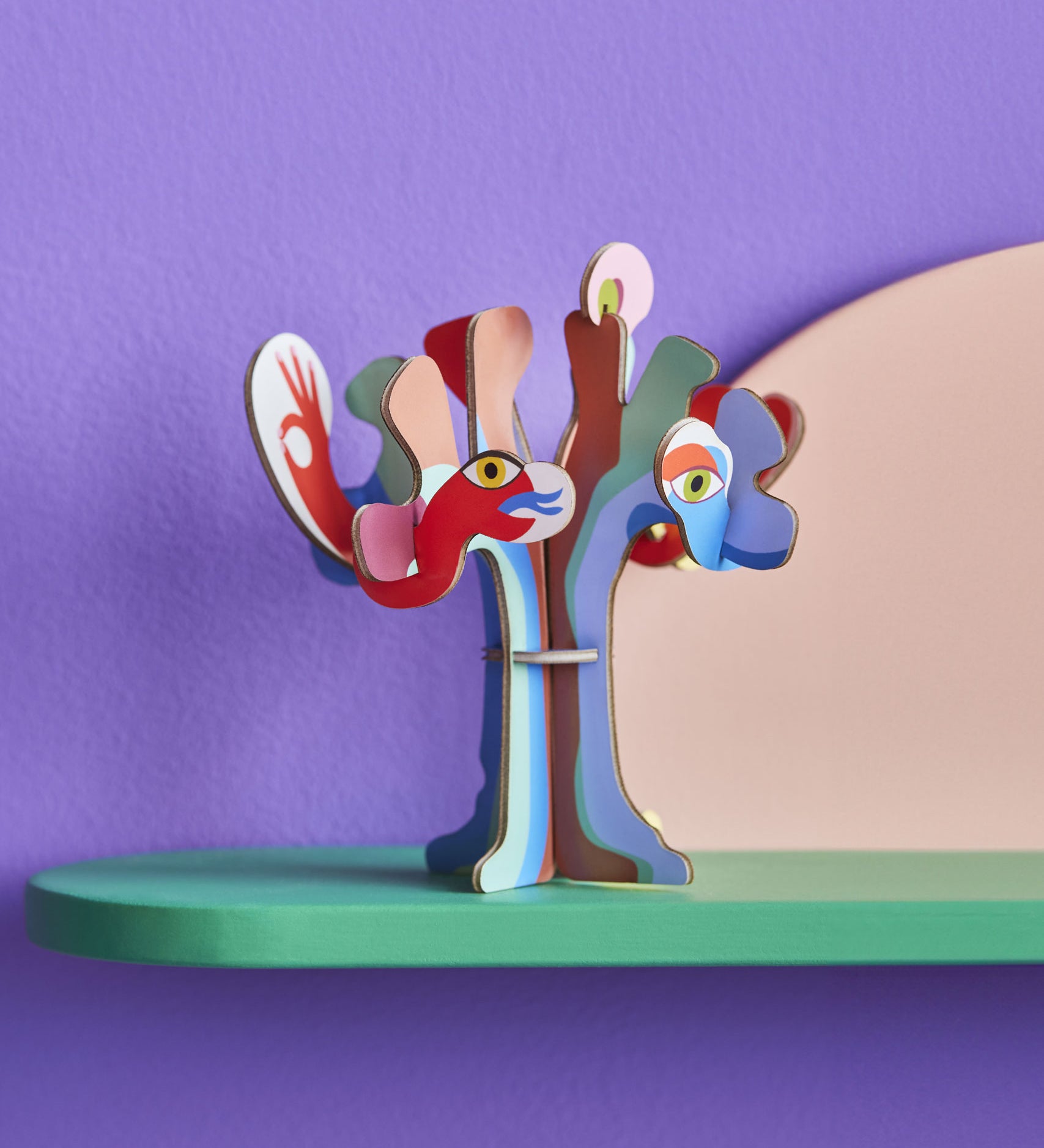 Studio Roof 3D Pop Out Card Dream Tree on a green shelf. A 3D cardboard DIY craft kit tree with different coloured leaves. This kit is part of a wide range of Studio Roof kits that are available at Babipur.