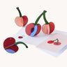 Studio Roof 3D Pop Out Card cherries. 3D DIY cardboard cherries next to a matching greetings card 
