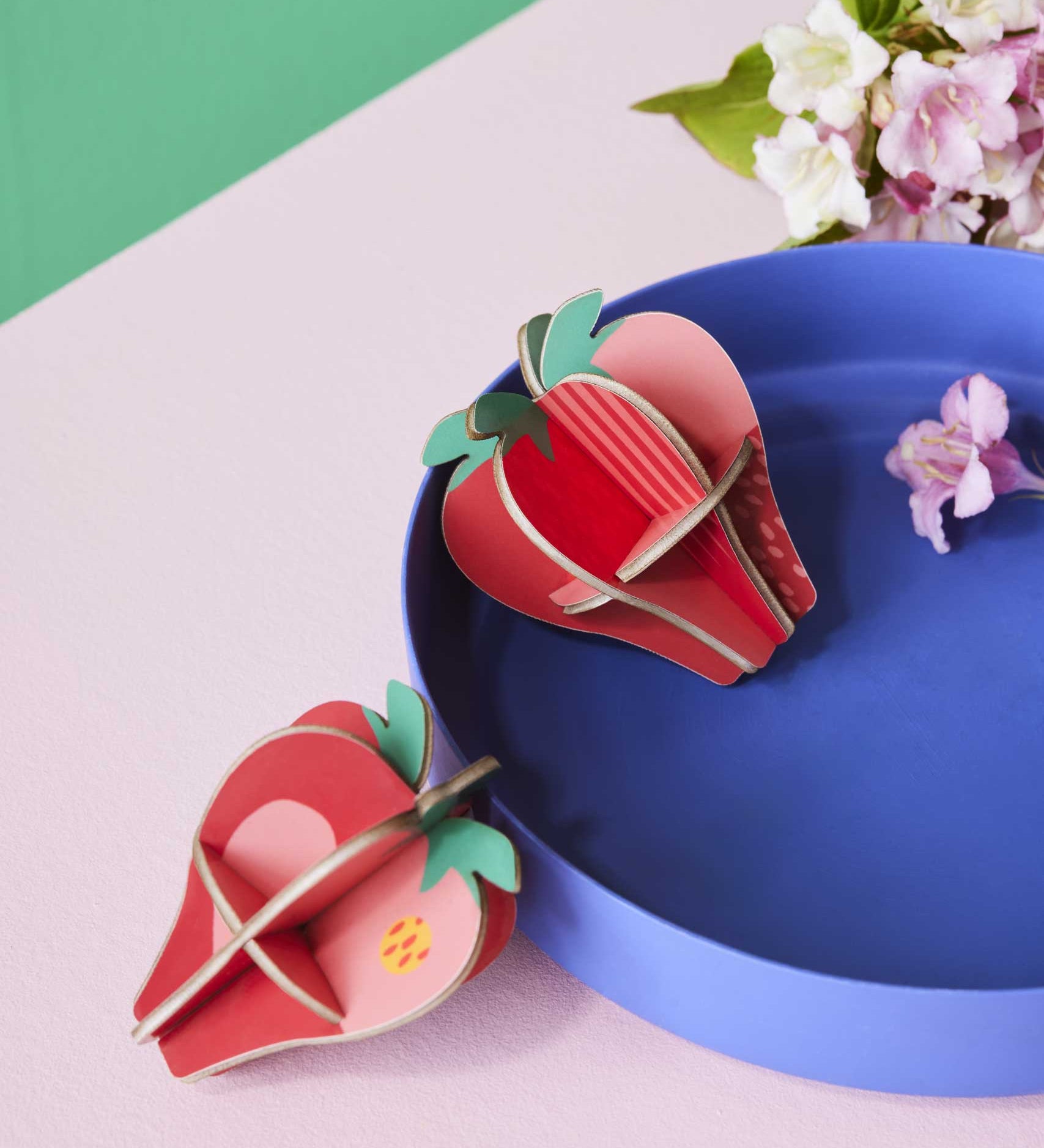 Studio Roof 3D Pop Out Card Strawberries placed on a blue tray. This 3D pop out card DIY kit is part of Studio Roof's fruits collection which is available at Babipur. 