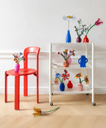 A trolley holding the everlasting flower Studio Rood 3D cardboard decorations