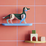  3D Art. A fun sausage dog model in shades of green