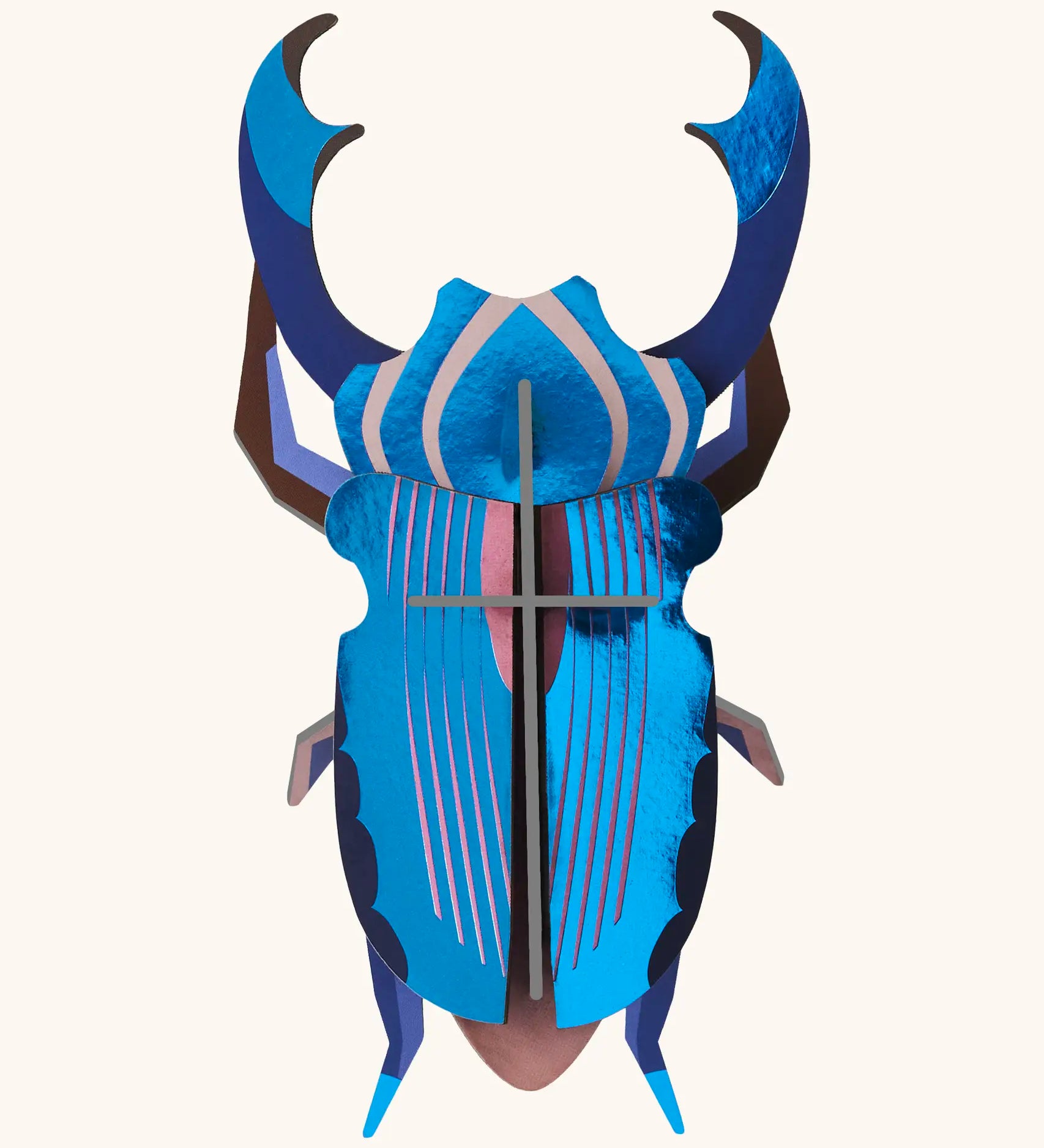 A Studio Roof 3D azure stag beetle cardboard wall art fully assembled with a metallic finish on the pieces.