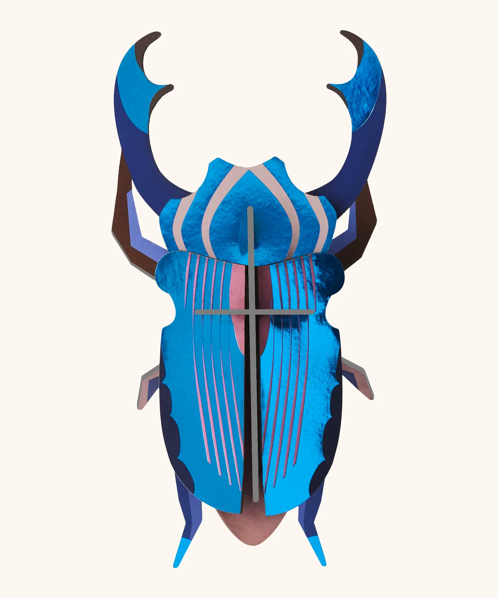 A Studio Roof 3D azure stag beetle cardboard wall art fully assembled with a metallic finish on the pieces.
