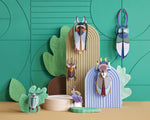 Studio roof eco-friendly cardboard slotting insect models attached to some brown