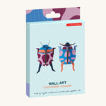 Studio Roof Coccinelle Couple Beetle decorations in their box pictured on a plain background