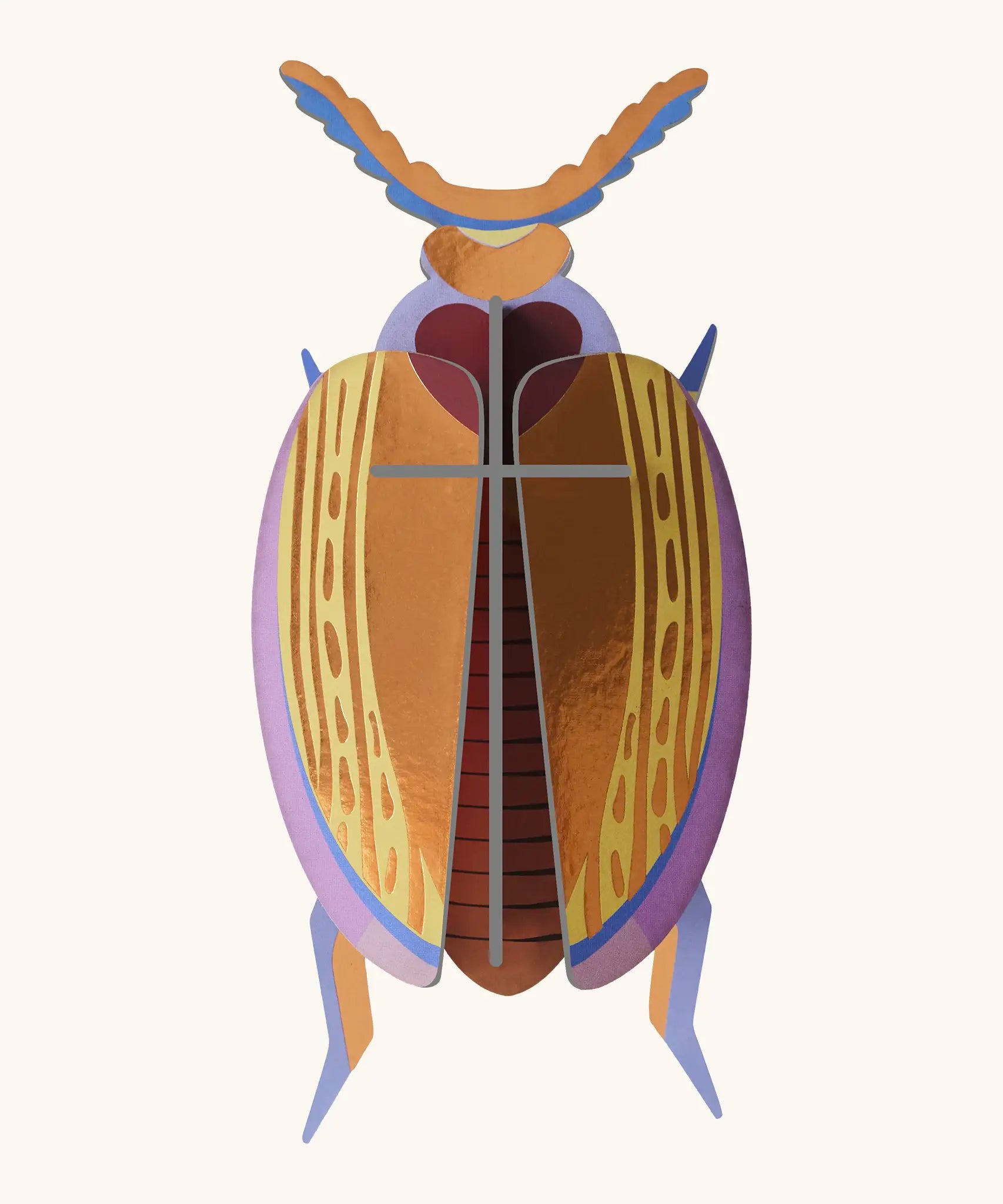 A Studio Roof 3D Cuprum beetle cardboard wall art fully assembled with a metallic finish on the pieces.