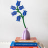 Studio Roof campanula everlasting flower decoration craft kit shown built and displayed in small purple vase.