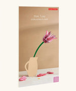 Studio Roof pink tulip everlasting flower cardboard decoration shown in it's packaging.