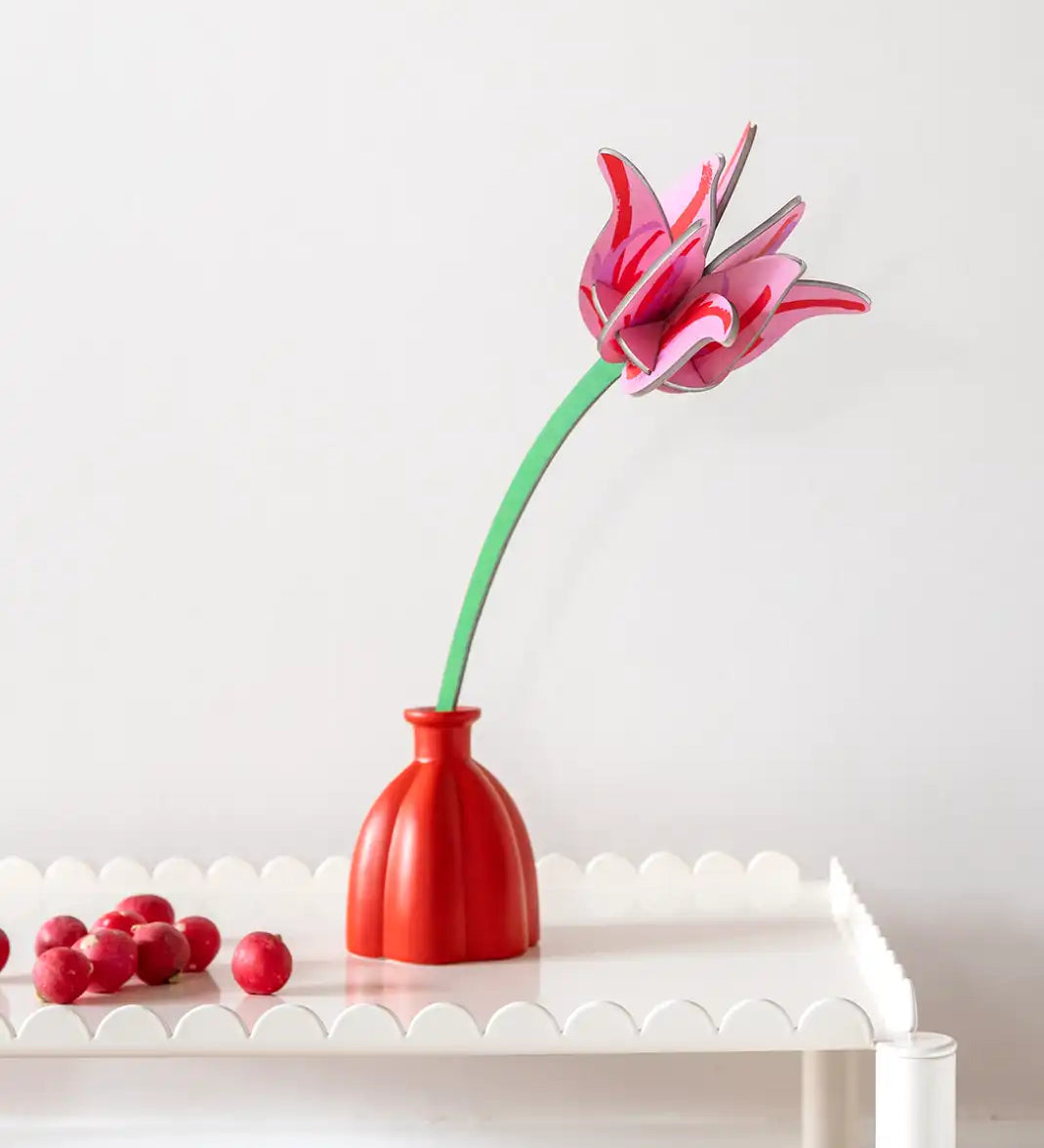 Studio Roof pink tulip everlasting flower cardboard decoration shown built and displayed in a red jar. 