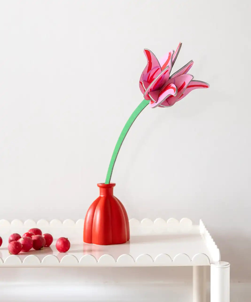 Studio Roof pink tulip everlasting flower cardboard decoration shown built and displayed in a red jar. 