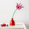 Studio Roof pink tulip everlasting flower cardboard decoration shown built and displayed in a red jar. 