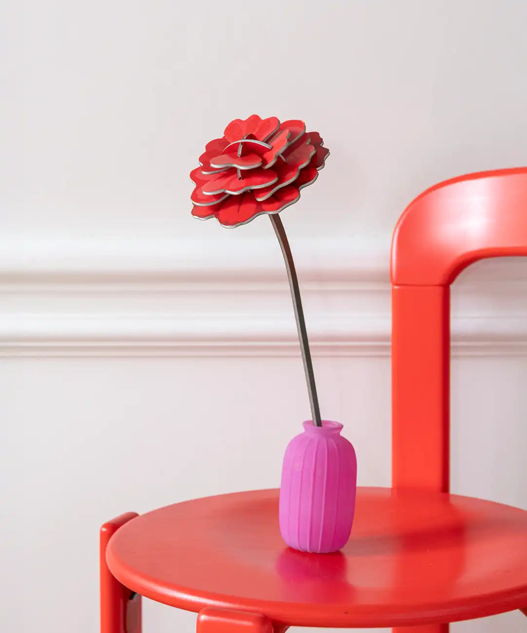 Studio Roof rose everlasting flower cardboard craft kit shown built and displayed in a small pink vase.
