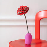 Studio Roof rose everlasting flower cardboard craft kit shown built and displayed in a small pink vase.