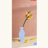 Studio Roof yellow tulip everlasting flower cardboard craft kit shown in it's packaging.