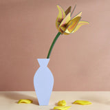 Studio Roof yellow tulip everlasting flower cardboard craft kit shown built and displayed in a vase.