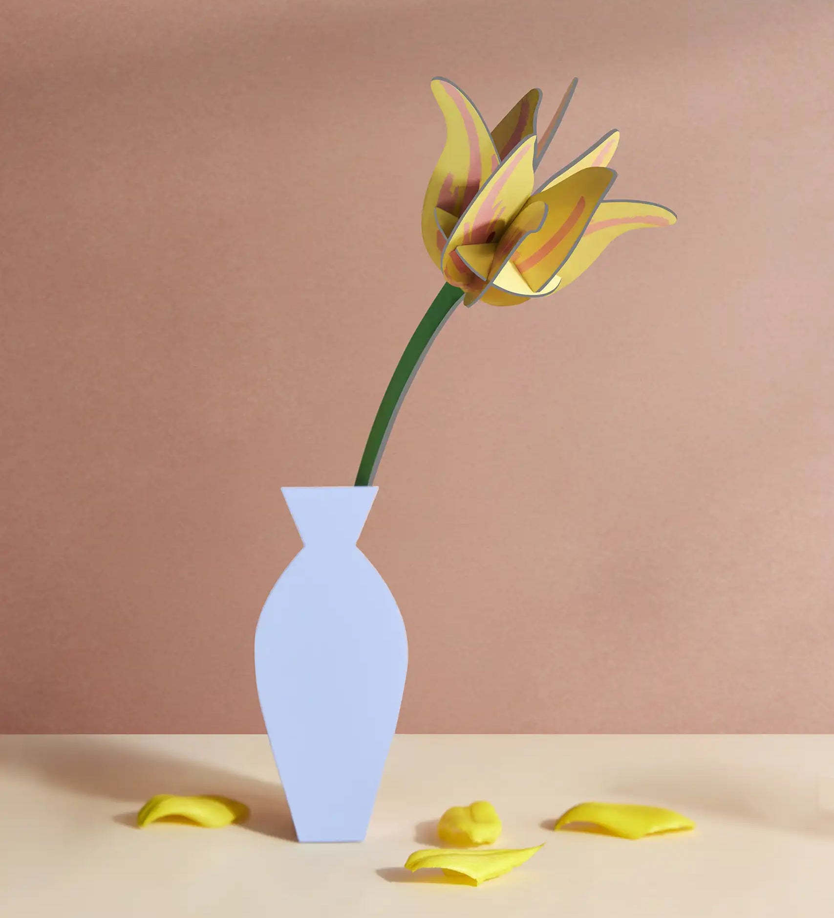 Studio Roof yellow tulip everlasting flower cardboard craft kit shown built and displayed in a vase.