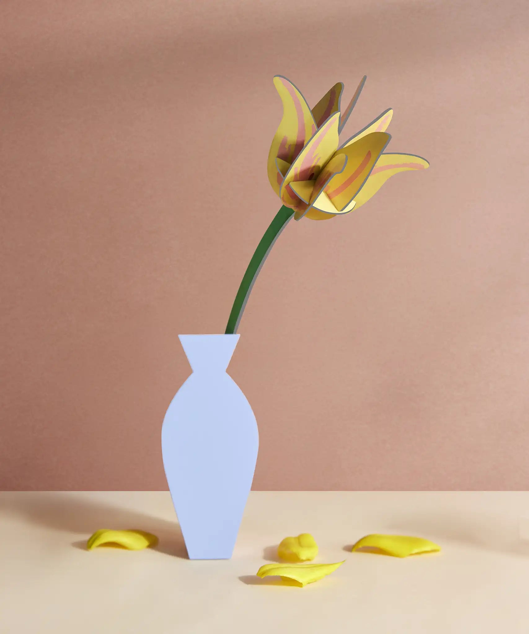 Studio Roof yellow tulip everlasting flower cardboard craft kit shown built and displayed in a vase.