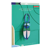 Packaging for the Studio roof eco-friendly antler beetle figure on a white background