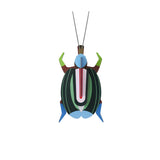 Studio Roof Green Fig Beetle pictured on a plain background