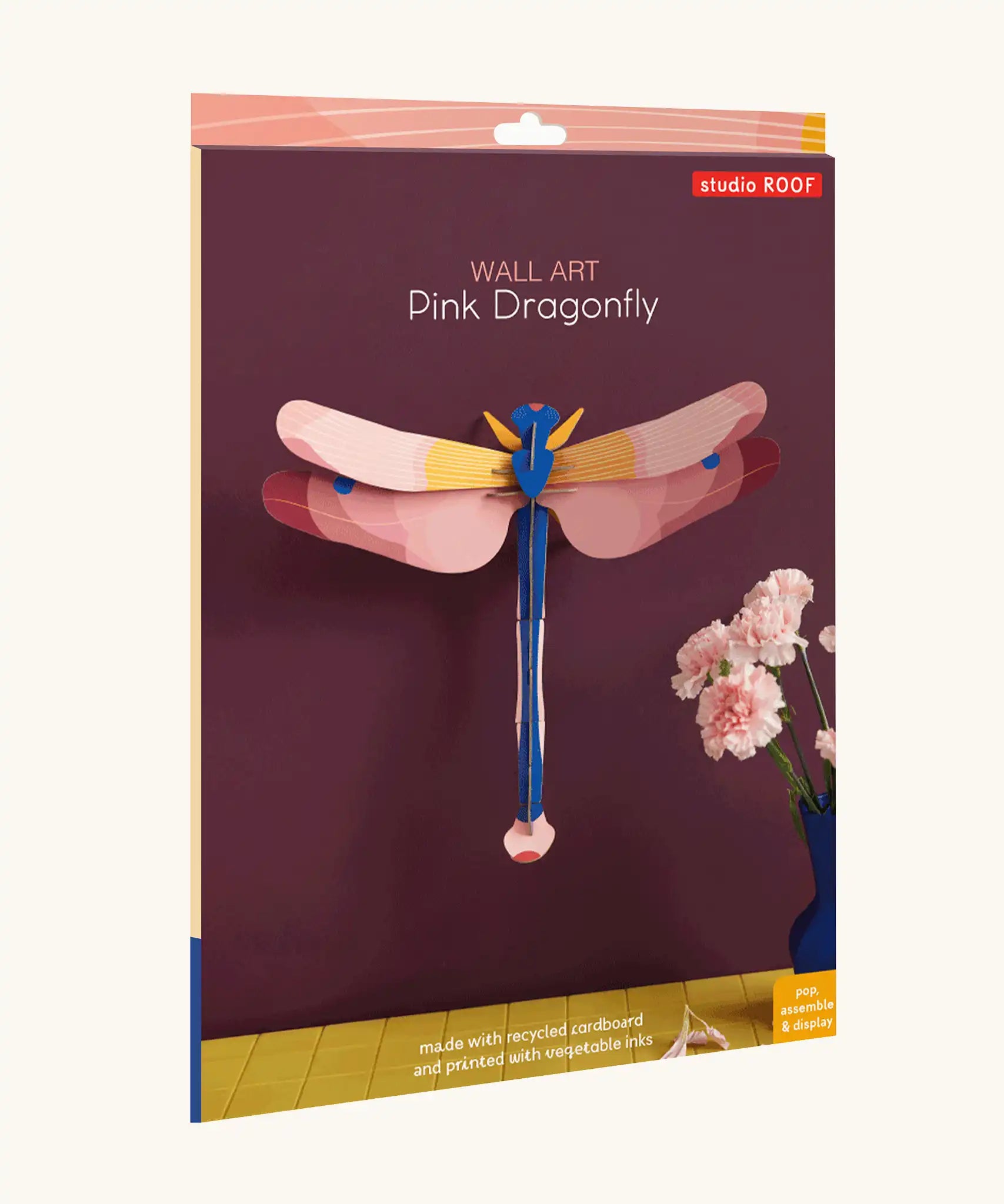 Studio Roof pink dragonfly cardboard wall art kit shown in it's packaging.