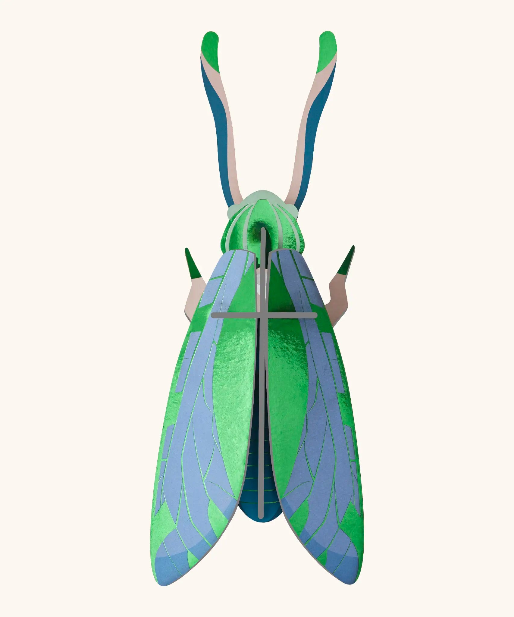 A Studio Roof 3D jade graasshopper cardboard wall art fully assembled with a metallic finish on the pieces.