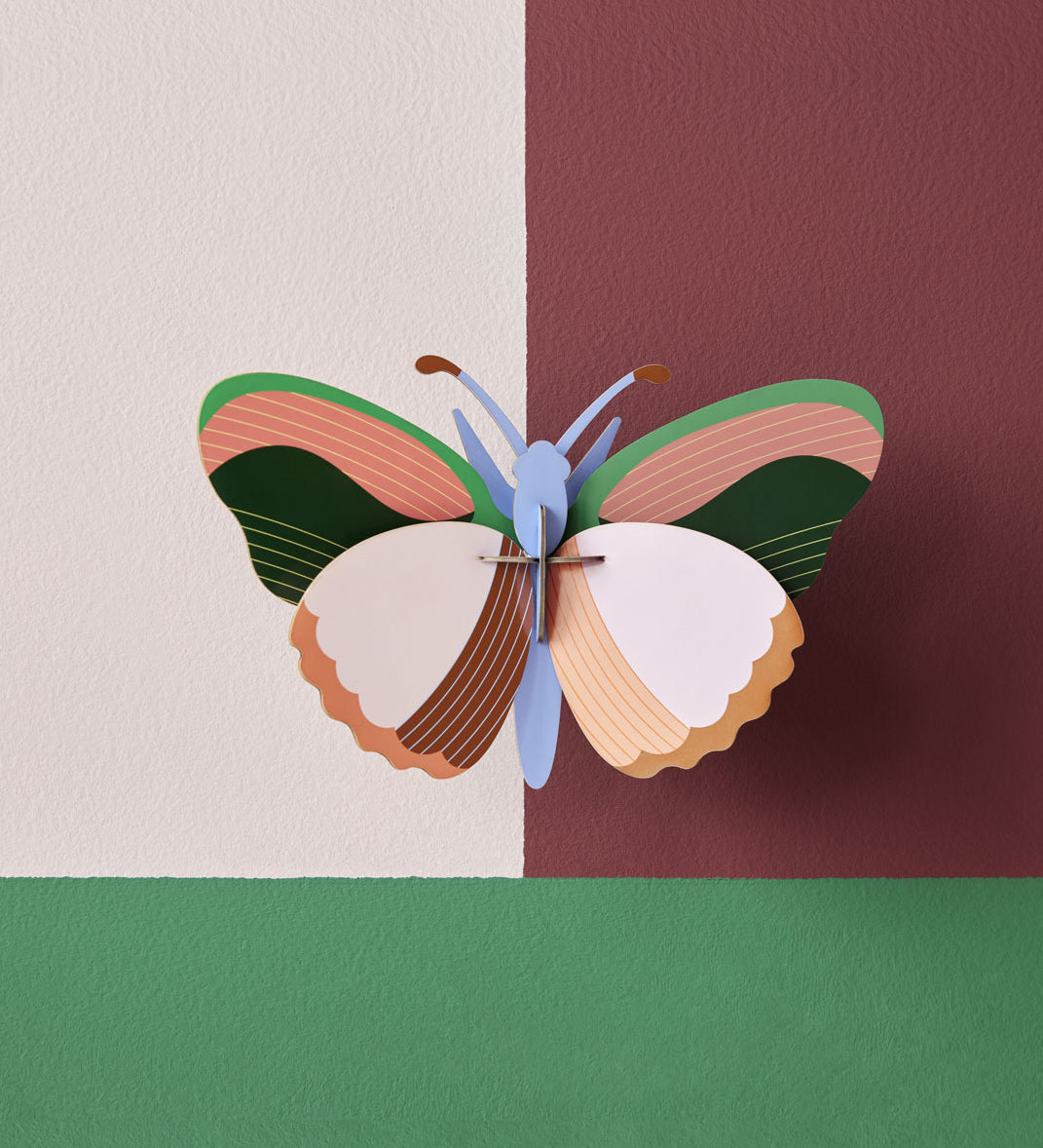 Studio Roof Medium Sycamore Butterfly pictured on a painted wall