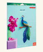 A Studio Roof 3D paradise peacock bird perched on a branch craft kit shown in it's packaging 