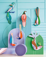 Studio Roof eco-friendly slotting paradise bird models hanging from purple