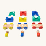 The pieces from the Tegu Big Top Magnetic Tram toy pictured on a plain background.