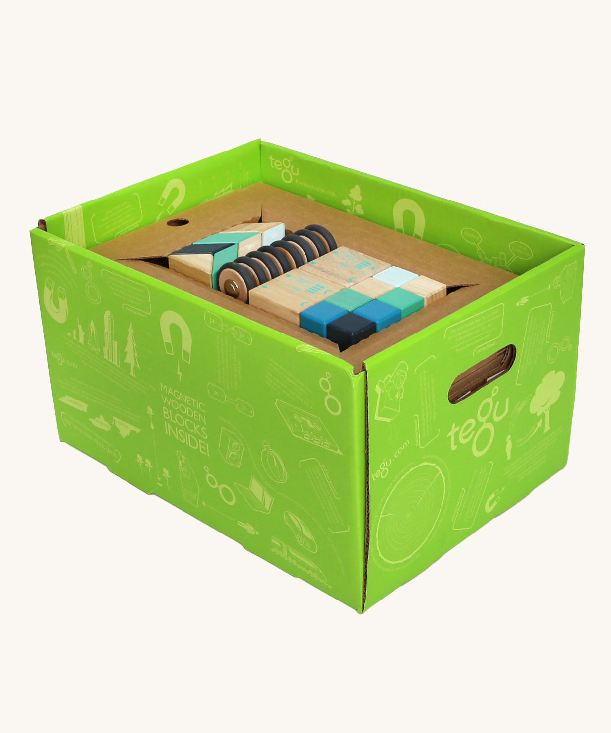 Tegu 130 piece magnetic block Classroom Kit in the Future blue tone colour way in their green coloured cardboard packaging box. 
