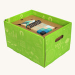 Tegu 130 piece magnetic block Classroom Kit in the Future blue tone colour way in their green coloured cardboard packaging box. 