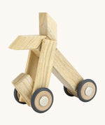 A clown car made from the Tegu magnetic wooden tiles and wheels