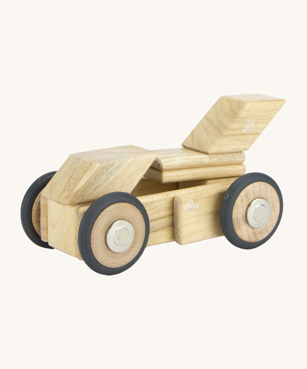 A sports car made from the Tegu magnetic wooden tiles and wheels