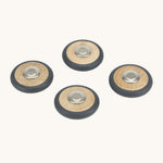A set of 4 Tegu wooden magnetic wheels, perfect for creating push and pull vehicles