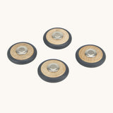 A set of 4 Tegu wooden magnetic wheels, perfect for creating push and pull vehicles