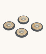 A set of 4 Tegu wooden magnetic wheels, perfect for creating push and pull vehicles
