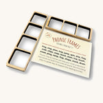 2 wooden phonics frames with a instruction leaflet on a cream background