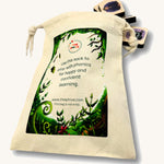 The cotton sack for the Phive phonic tiles with some phonic tiles coming out of the sack on a cream background