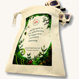 The cotton sack for the Phive phonic tiles with some phonic tiles coming out of the sack on a cream background