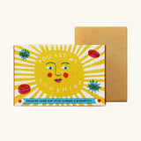 The Printed Peanut sunshine natural handmade orange and grapefruit soap bar standing to its decorated box showing the sun