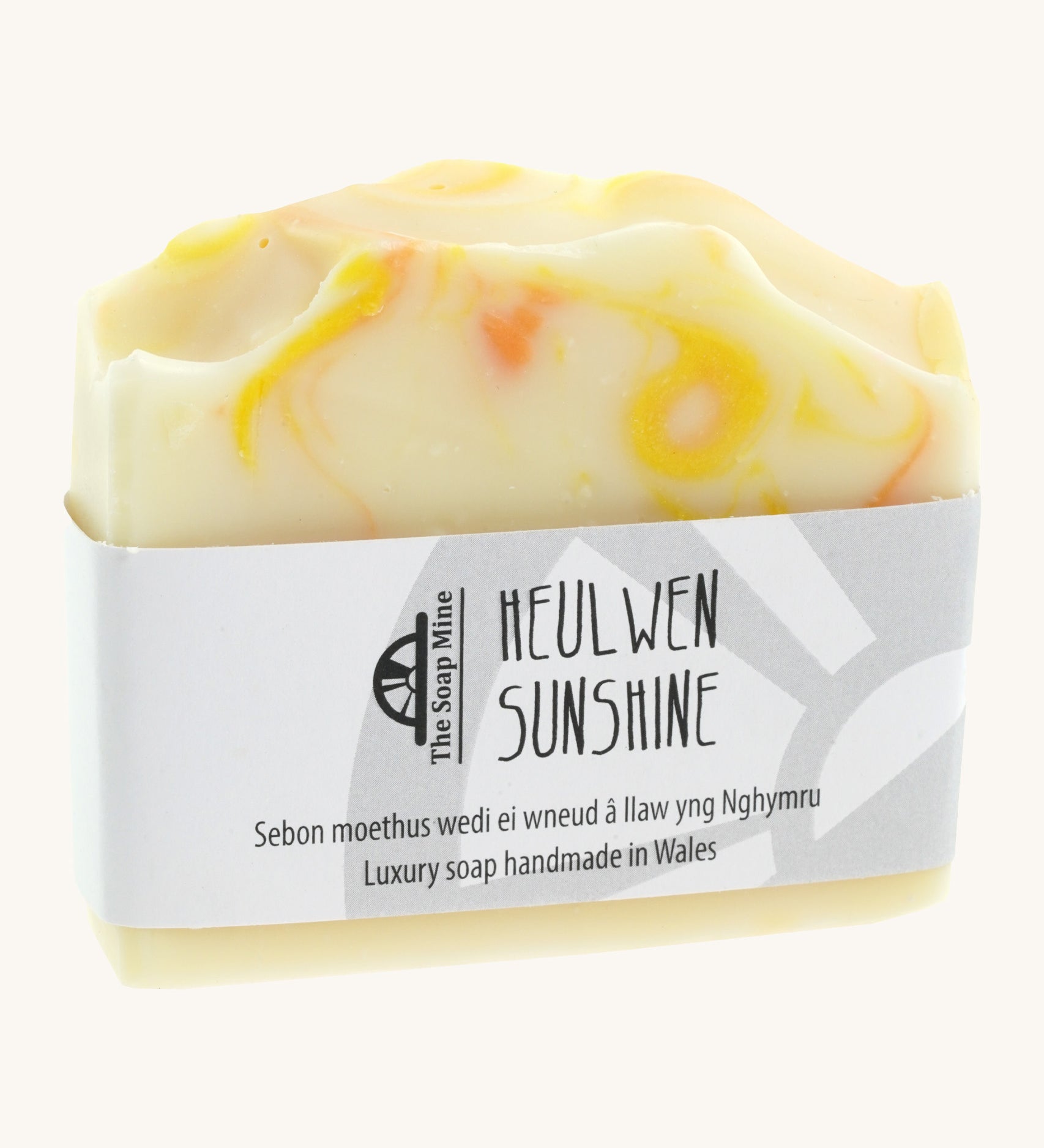 The Soapmine heulwen/sunshine bar. A Handmade soap available at Babipur with Bergamot and Mandarin essential oils. Comes with branding paper strip. 