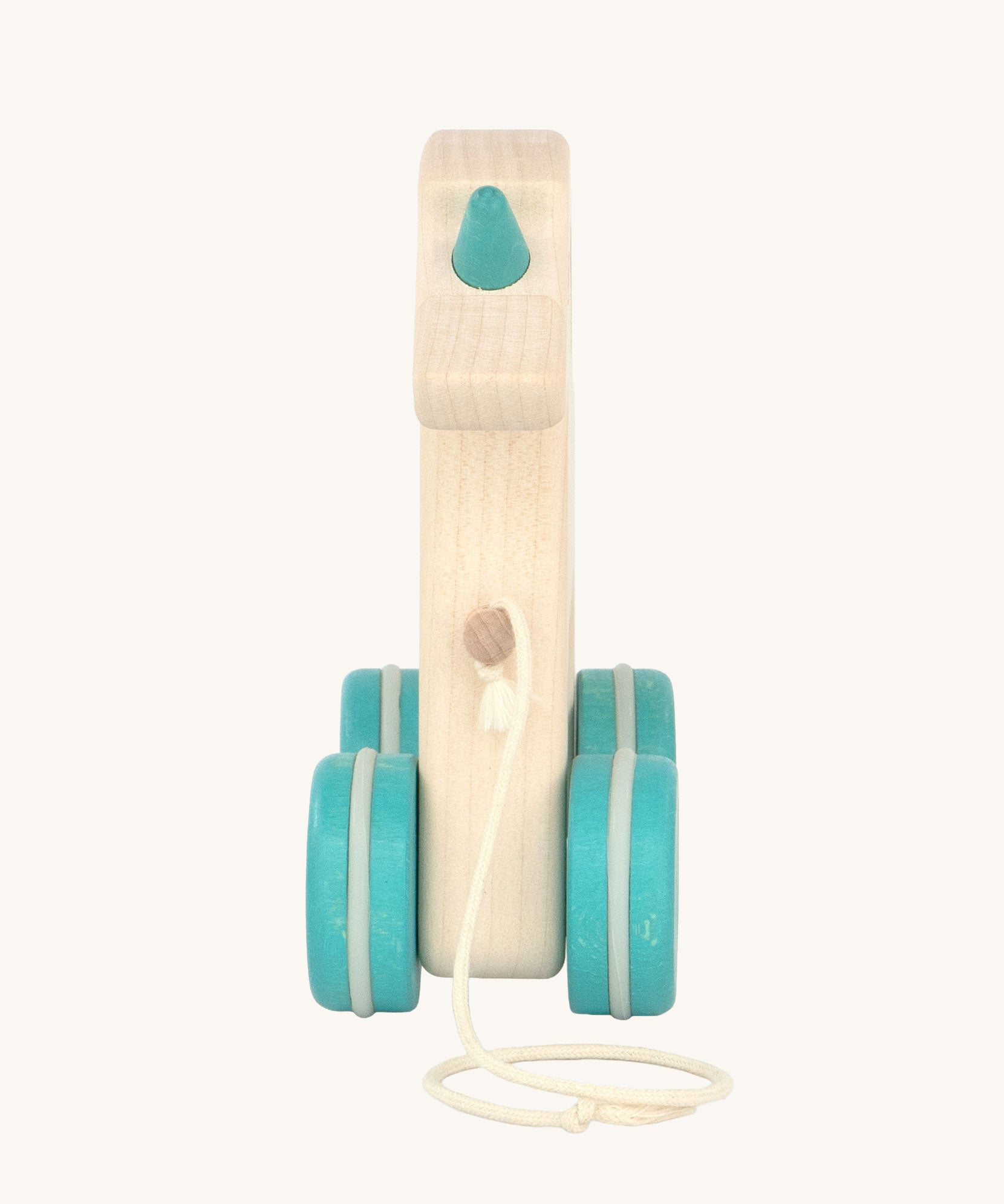 A view of the front of the Tobe Pull Along Unicorn wooden toy. Tobe is part of the Bajo family. These heirloom quality toys by Bajo are part of a wide range of wooden toys available here at Babipur.