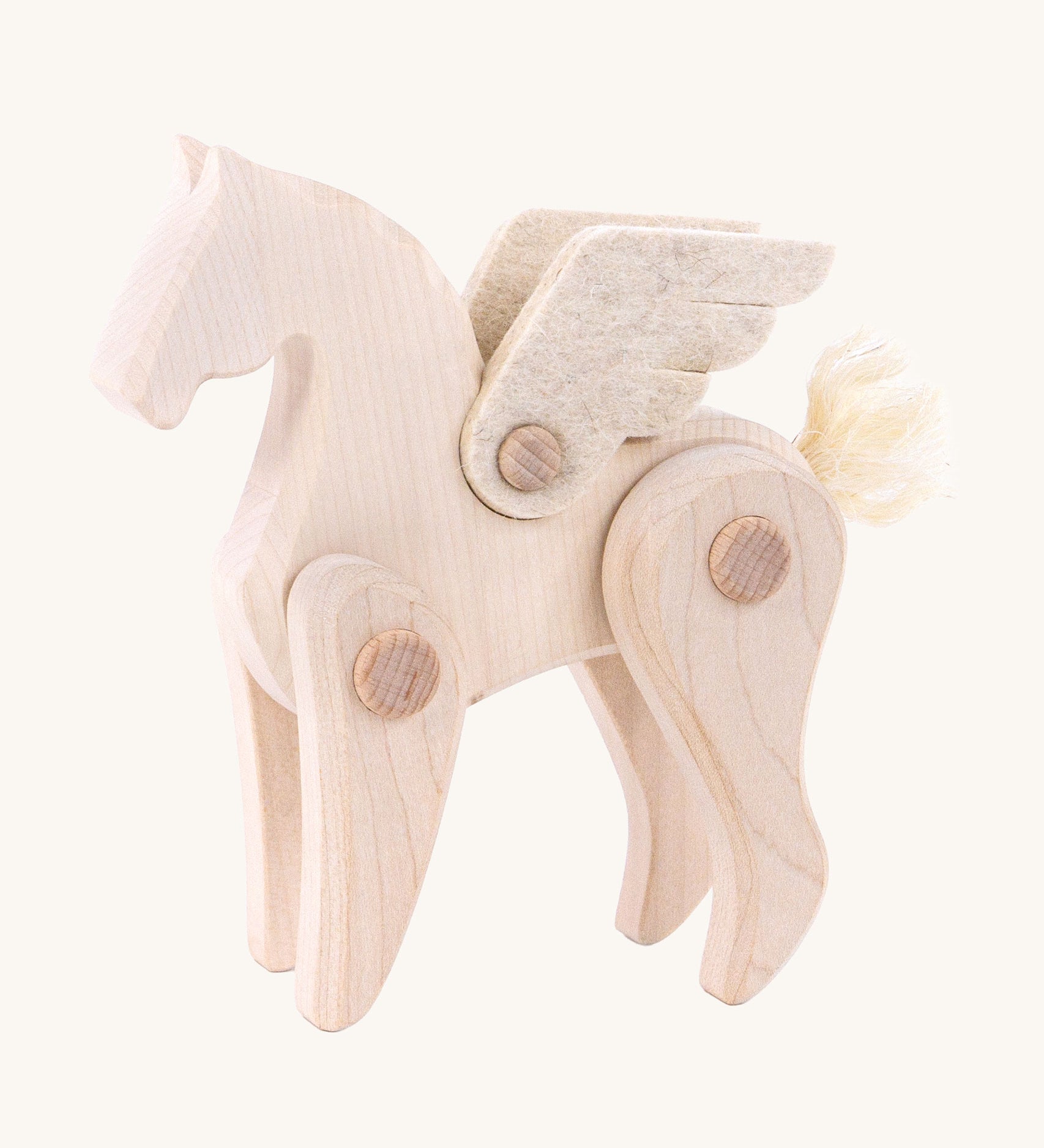 Tobe natural light wood pegasus toy figure with pose-able limbs. Tobe is part of the Bajo family. These heirloom quality toys by Bajo are part of a wide range of wooden toys available here at Babipur. 