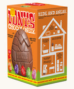 Tony's salted caramel sea salt chocolate hollow Easter egg in a orange cardboard box on a plain background, the box is at an angel showing the side of the box.