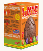 Tony's salted caramel sea salt chocolate hollow Easter egg in a orange cardboard box on a plain background, the box is at an angel showing the side of the box.