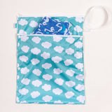 Tots Bots Wet andDry Bag in the Fluffy Clouds print with a bamboozle nappy in the front pocket