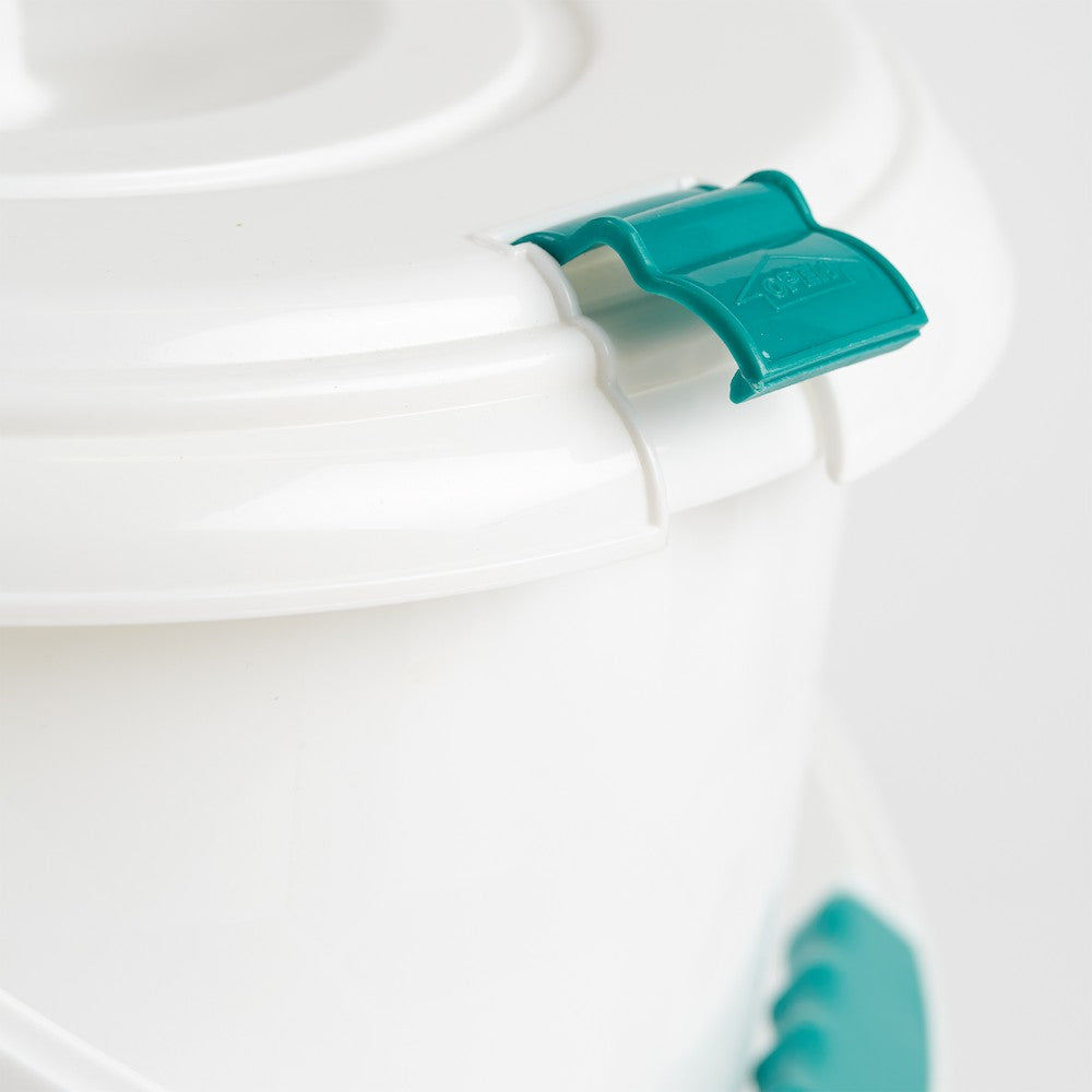 Close up of the locking lid on the tots bots eco-friendly reusable nappy laundry bucket on a white background
