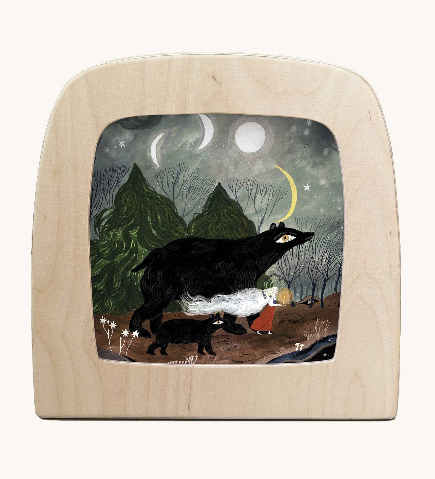 Toverlux Magic Lamp Silhouette Illustration Black Bears by Tijana Draws. The artwork features black bears walking through a forest accompanied by a lady with a lit candle. We have a range of Toverlux silhouettes, lamps and accessories available at Babipur.